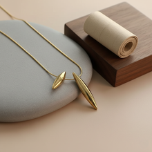 Dual Drop Pendanton a neutral background