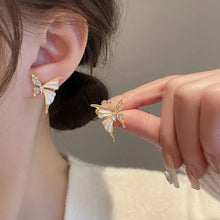 Gold Enamel Crystal Butterfly Stud wearing woman