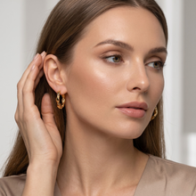 Gold Twisted Wave Huggie Hoop Earrings
