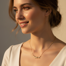 Woman wearing a Gold Plated Tiffany Knot Pendant