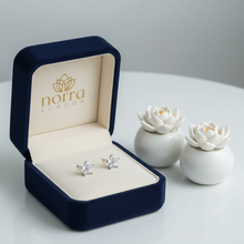 Elegant Silver Floral Stud Earrings with Marquise Cut CZ Stones